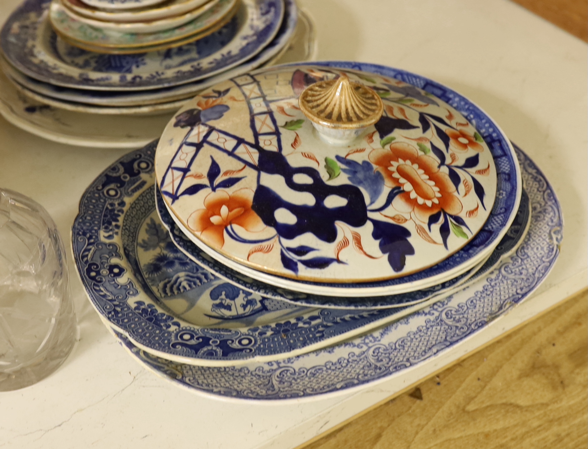A quantity of assorted ceramics and glass including a group of 19 century blue and white pottery, a Victorian heavy cut glass decanter and stopper etc.